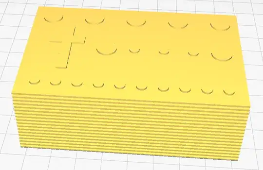 Screenshot of a rectangular 3D model with circles and a cross on top in Cura