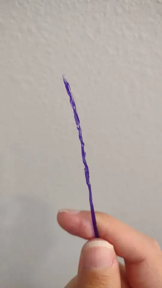 a transparent blue PLA filament is twisted in it's appearance