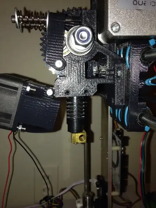 Image of two holes in the side of the x-carriage with a J-Head Extruder just below it, with ring exposed