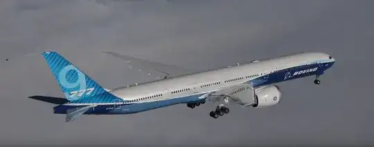 777-9 over clouds with gear down - screenshot from Sam Chui's video