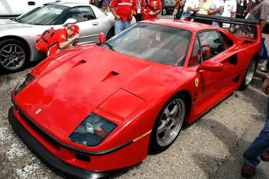 https://upload.wikimedia.org/wikipedia/commons/3/3e/Ferrari_F40_in_IMS_parking_lot.jpg