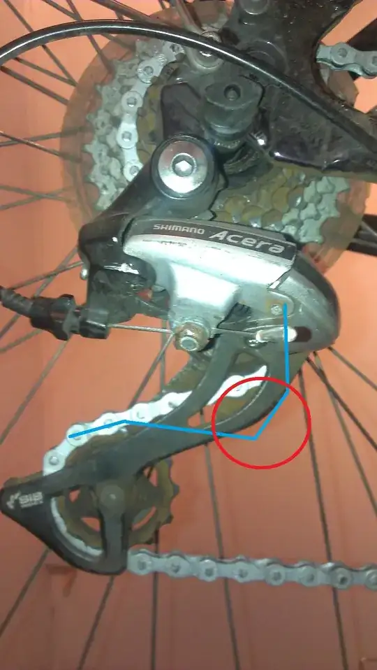 The current chain setup - old path shown in Blue. The chain was threaded around a metal part of the deraileur in the Red circle.