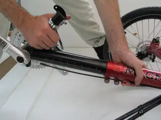 Trike boom being adjusted