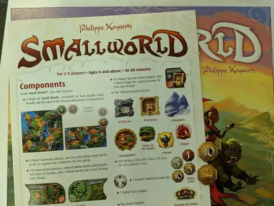 photo with the rulebook and two coins