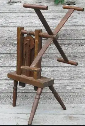 antique skein winder with four arms