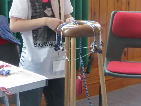 second photo of same boy braiding