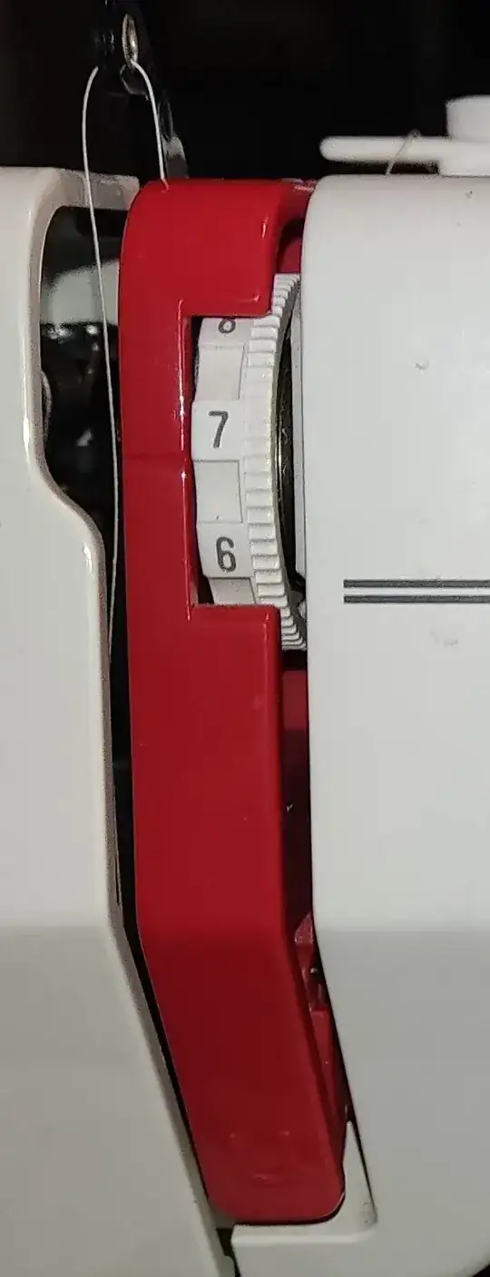 a photo of a thread properly wrapped around the thread-guide.