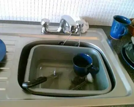 plastic bowl in a sink