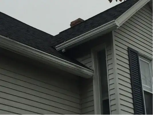 dormer with short gutter