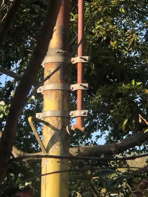 detail of pole, with water hookup and valve