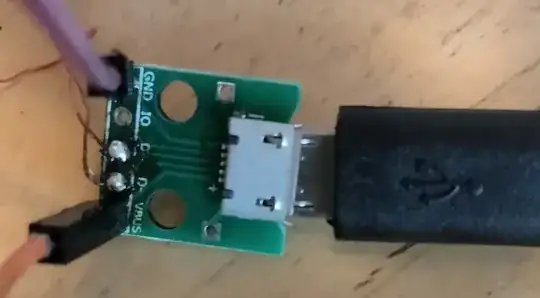 female micro USB pcb with red wire on D+, brown wire on D-, pinned orange wire on VBUS and pinned purple wire on GND