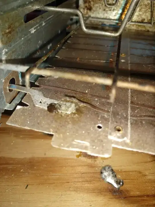 Nichrome wire lifted away from rivet