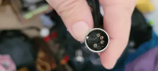 **this is the only connection on a beautiful PE 2005 Turntavle I came across. It spins quietly and I'd love to give it a listen, but I dint know what kind of connection this is. **