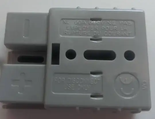 Picture of an andersen connector with For Disconnect Use Only written on it