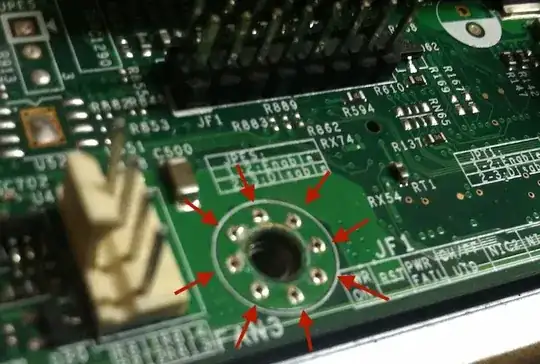photo of printed circuit board with eight vias around a mechanical screw hole