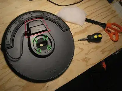 Cymbal underside with screws and loose part marked