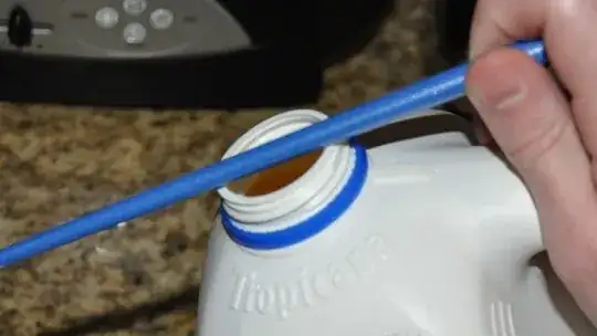 Guide bar for pouring a liquid