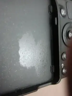 camera body with oil spot