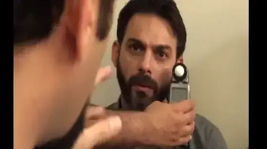 image of someone holding a device next to a person