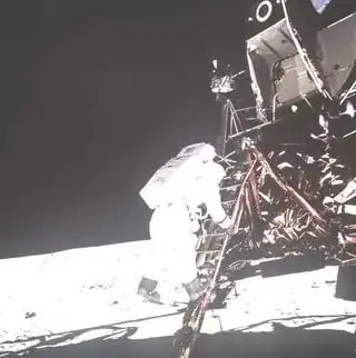 AS11-40-5868 (July 20, 1969) ALDRIN DESCENDING LADDER - Contrast +60, Brightness +100