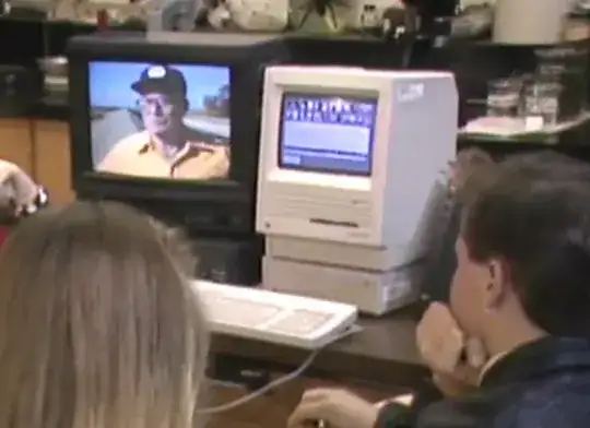 Monochrome Macintosh displaying color video on a separate monitor using a Pioneer LaserDisc player.