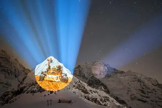 A giant projection of the NASA Mars 2020 mission Perseverance rover on the Tschuggen mountain (left) and Mars planet on the Jungfrau mountain (right), by Swiss light artist Gerry Hofstetter, is pictured from the alpine resort of Mannlichen, Switzerland, Feb. 15, 2021.