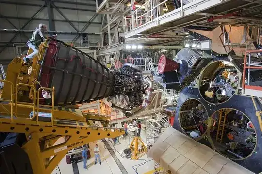 SSME installation. Engine bell, turbopump and lots of plumbing are installed as a unit