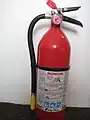 A typical dry chemical extinguisher containing 5&nbsp;lb (2.3&nbsp;kg) of monoammonium phosphate dry chemical