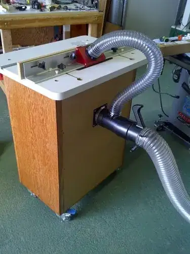 Multi-port dust collection for router table