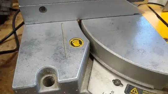 Poor, unloved miter saw base with oxidation