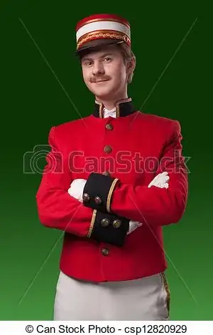 Stock photo of a concierge (porter). The porter is wearing a red shirt with large brass buttons, black cuffs with large brass buttons, a black shirt collar, and a matching hat. (CanStock photo ID csp12820929)